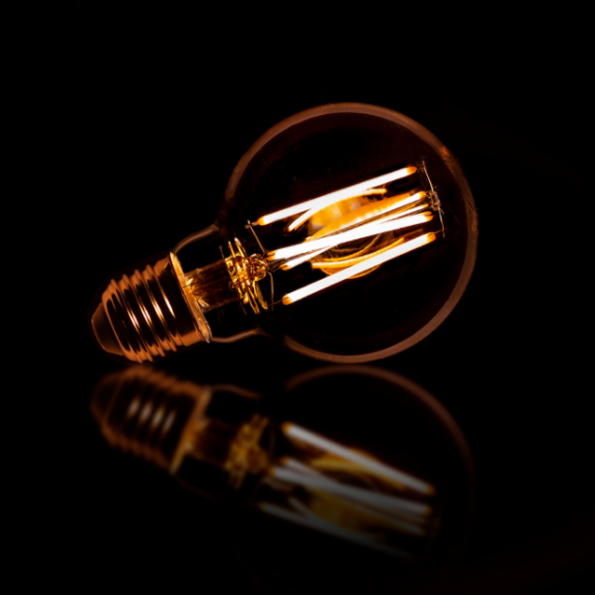 Ampoule globe ambré 7cm à LED filament E27 lumière chaude